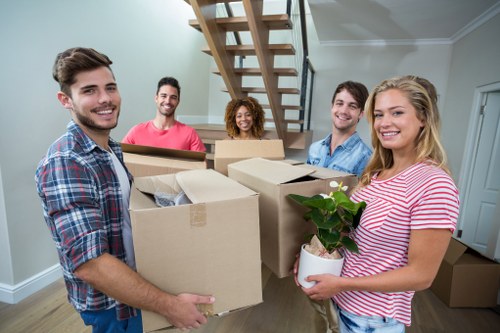Professional movers assisting with packing