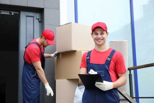 Professional team packing office equipment for relocation in Bromley