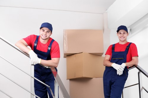 Professional movers handling furniture during relocation in Bromley